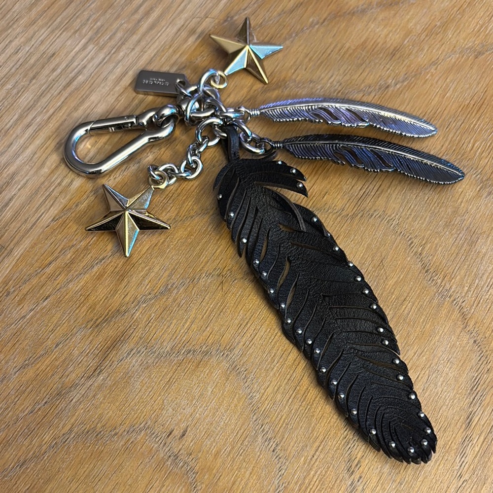 Coach Black Feathers Keychain with Star Charms